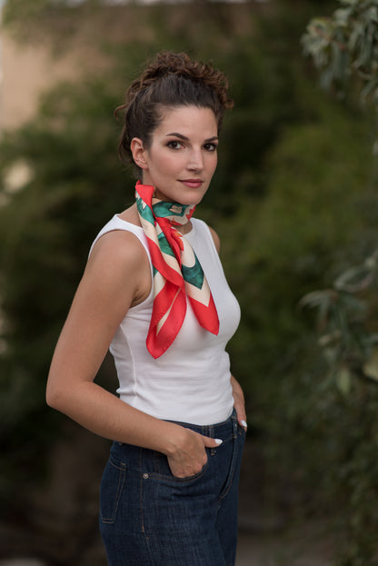 Model styling Teal Attica Garden silk scarf by Ariadne Kritonos tied as neck accessory