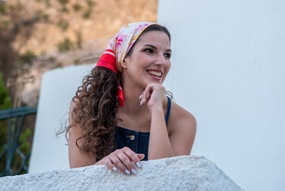 Video of model wearing pink Attica Garden silk scarf, ending with blue Attica Garden scarf shown on second model